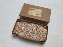 Load image into Gallery viewer, Wooden pegs in vintage &quot;Feldpost&quot; box
